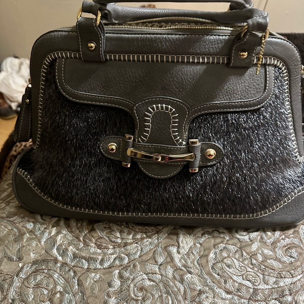 Grey Handbag with faux fur and leopard cloth interior. Nice fashion statement!!